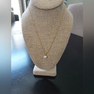 Gold tone sparkly stone necklace